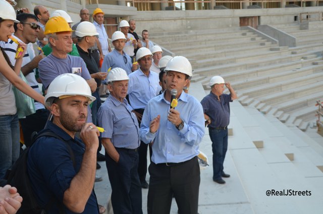 Hard hats in construction stie, sports arena Jerusalem